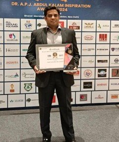 Chairman Sri Arimanda Siddhartha Reddy receiving the Most Innovative Educationalist Award
