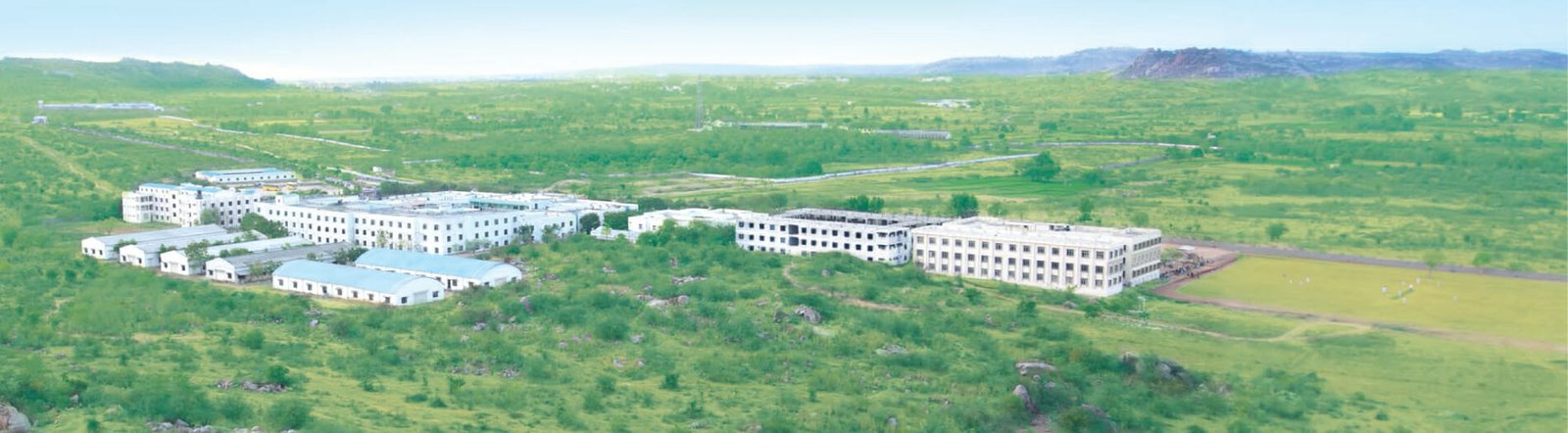 A wide aerial panorama of the HITS campus at Bogaram, Keesara
