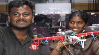 Students working hands-on with drone airframes and flight systems